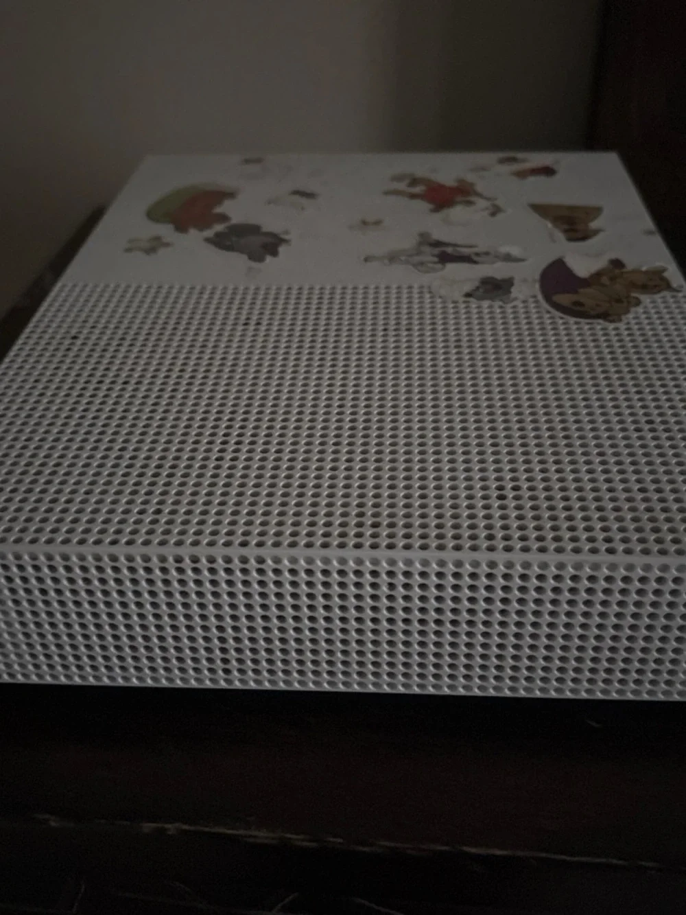 White Gaming Console with Decorative Stickers